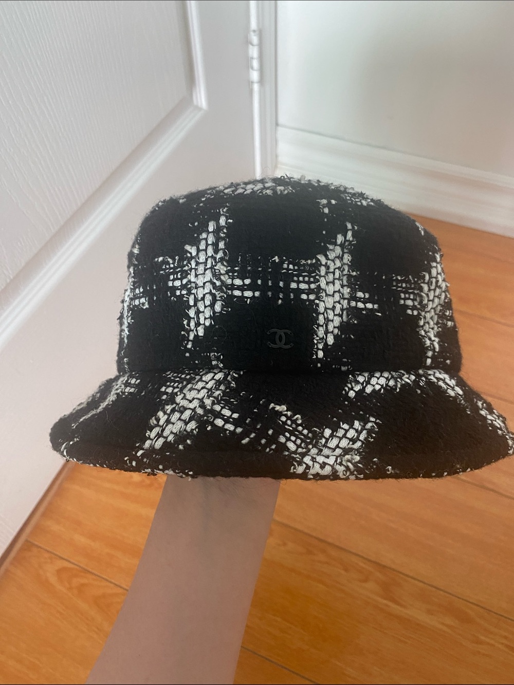 CHANEL Black and White Tweed Bucket Hat with Signature Logo